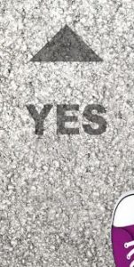 The word 'Yes' is shown on the ground below an arrow and in front of someone's shoe.