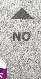 The word 'No' is shown on the ground below an arrow and in front of someone's shoe.