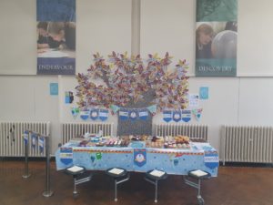 The Bake Sale table in front of of special STEM banners