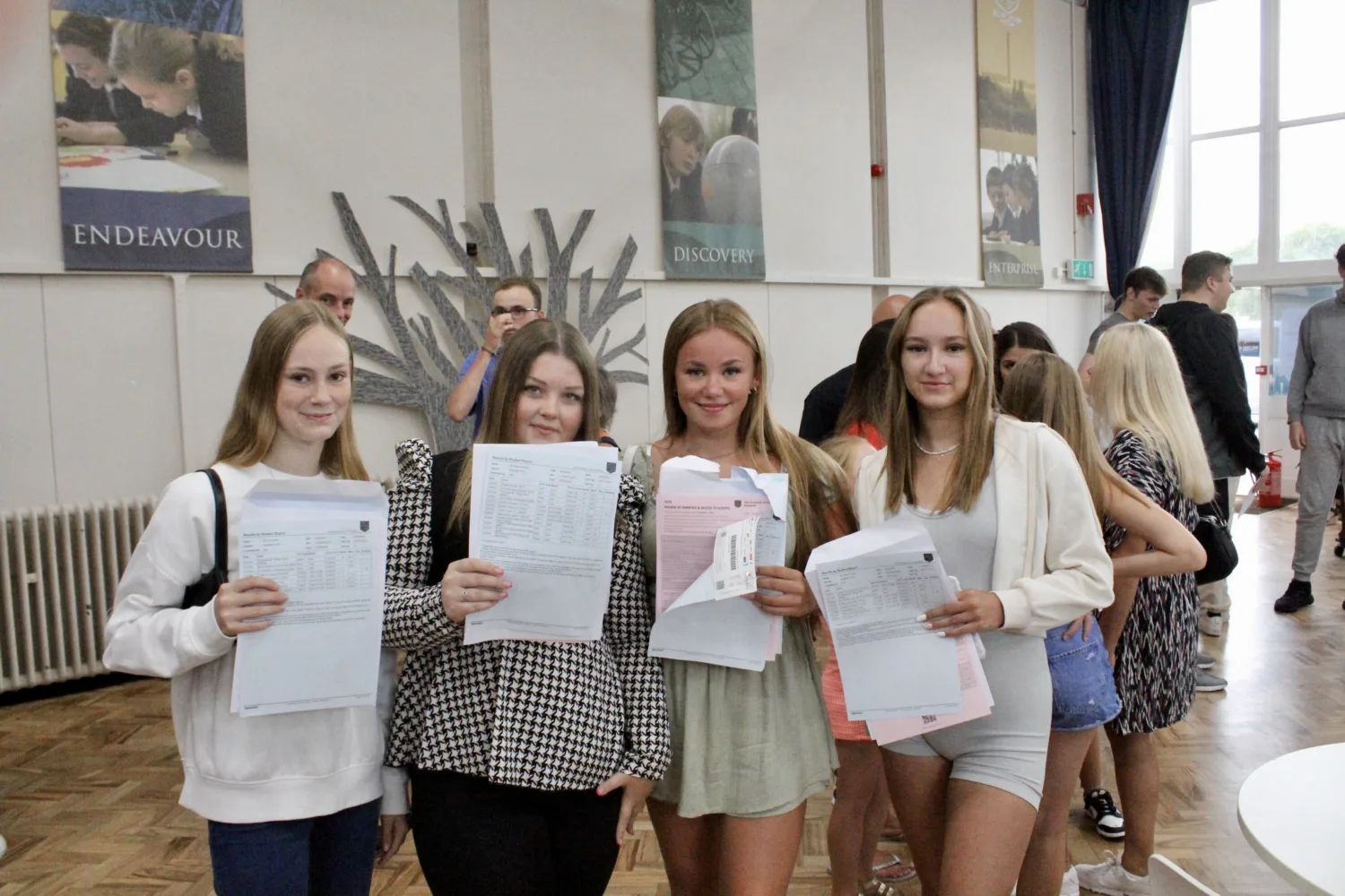 Students holding their results