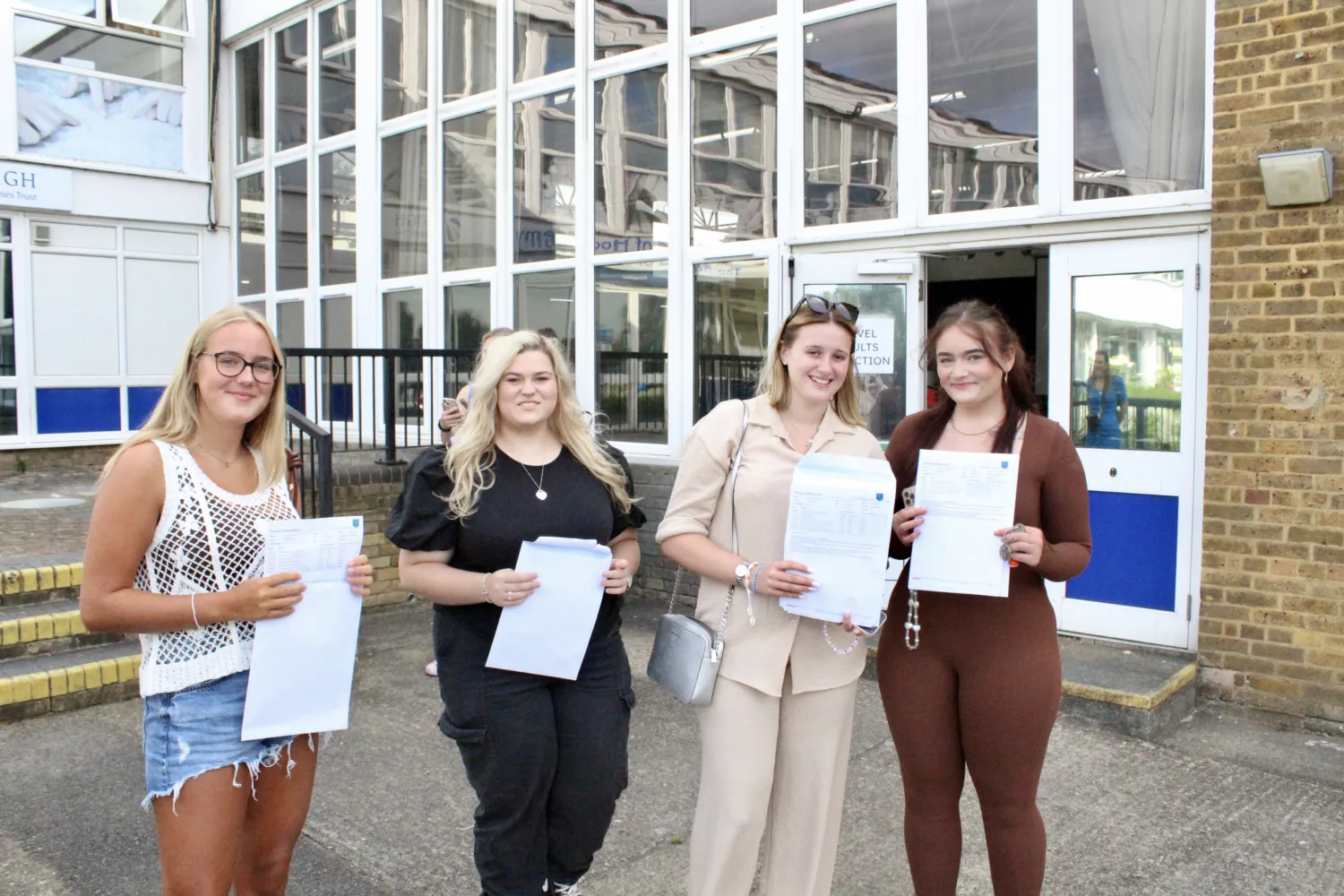 Students holding their results