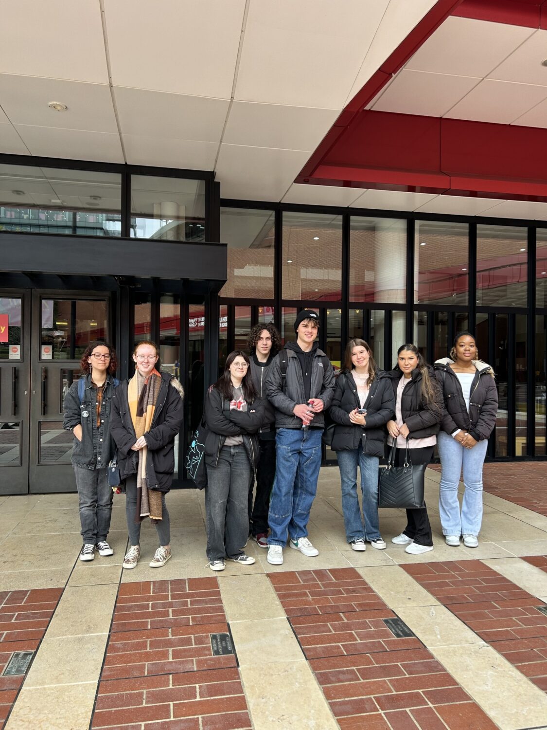 A group of students smiling for a photo
